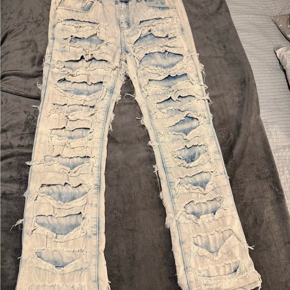 Distressed Light Blue Ripped Jeans - Picture 1 of 6